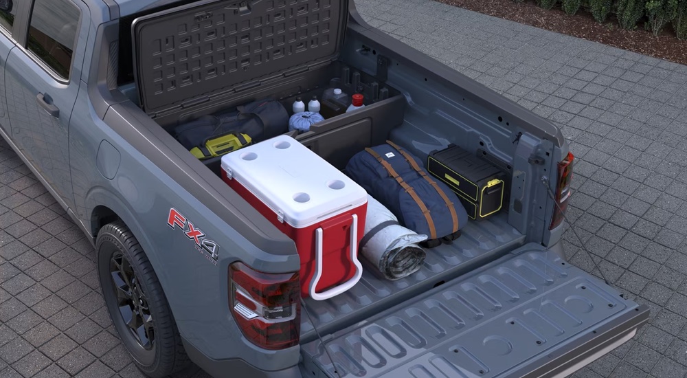 Overhead view of the Flexbed in a grey 2025 Ford Maverick at a Ford dealer near Metamora.