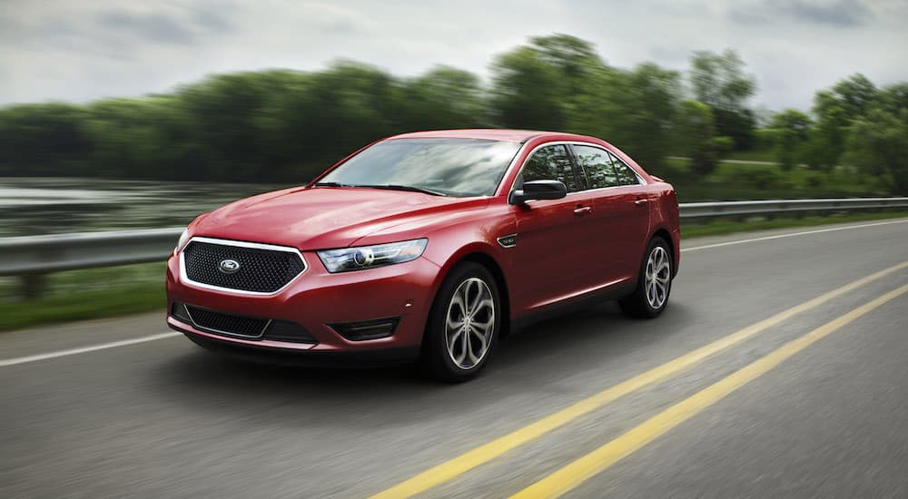 A red 2017 Ford Taurus SHO after leaving a used Ford dealer near Peoria.