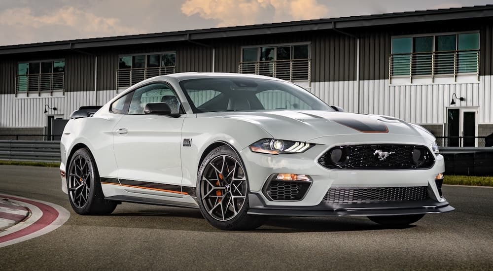 A grey 2021 Ford Mustang Mach 1 parked on a track.