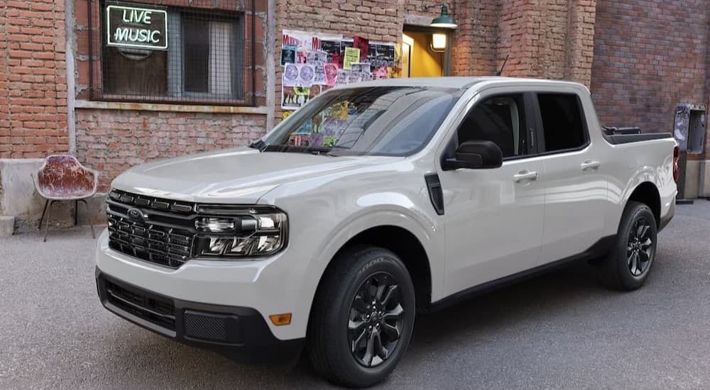 A white 2024 Ford Maverick parked after viewing used trucks for sale near Eureka.