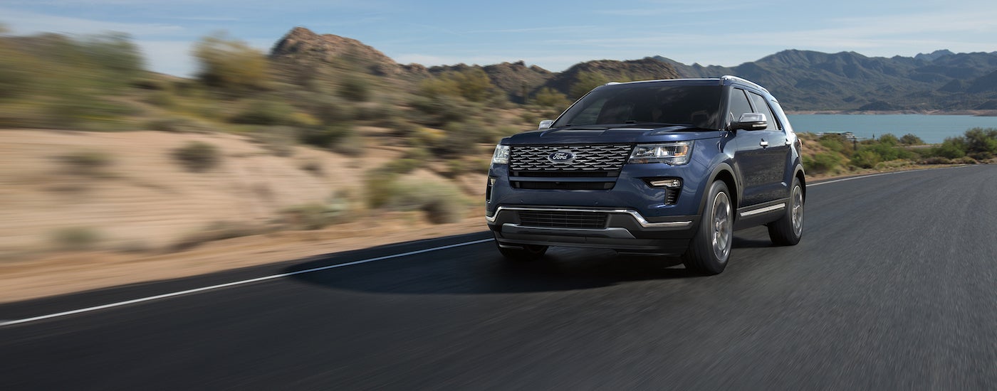 A blue 2019 Ford Explorer is shown from the front at an angle.